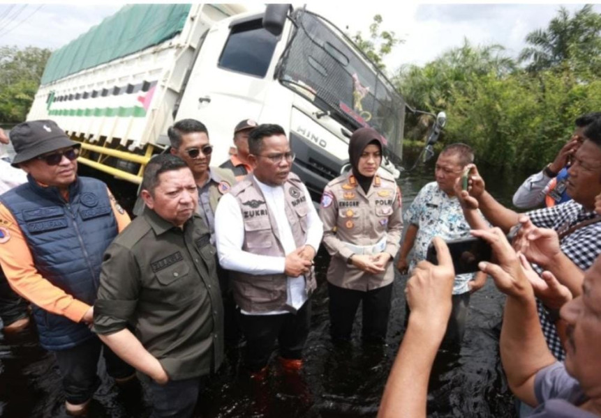 Jalintim KM 83 Terendam Banjir, Bupati Pelalawan Desak Pemerintah Pusat Bertindak Cepat