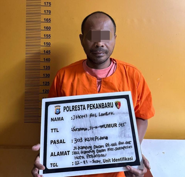 Polresta Pekanbaru Tangkap Pelaku Judi Online di Kampung Dalam