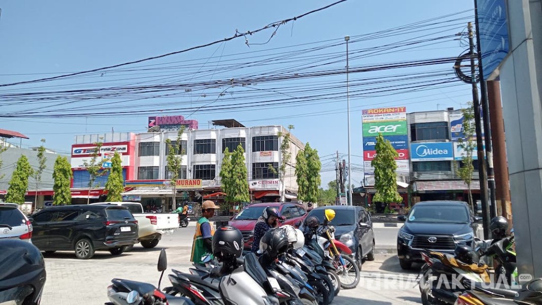 DPRD Pekanbaru Dukung Penghapusan Retribusi Parkir di Retail Modern